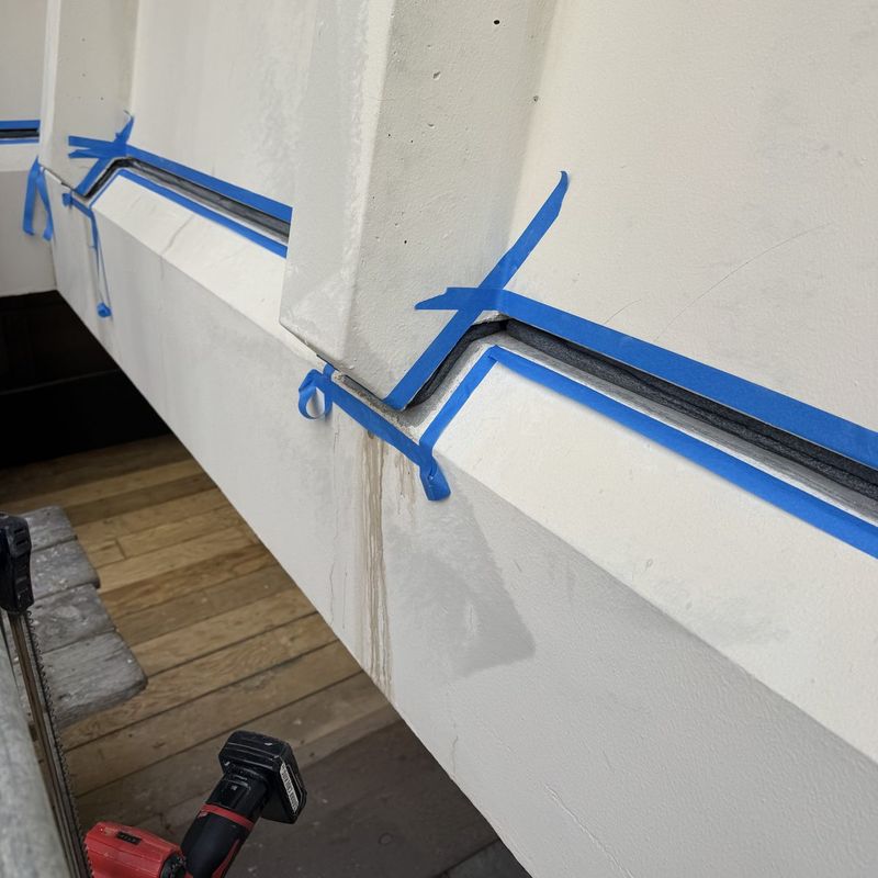 Backer rod set in a precast panel joint, edges masked, before sealant is installed