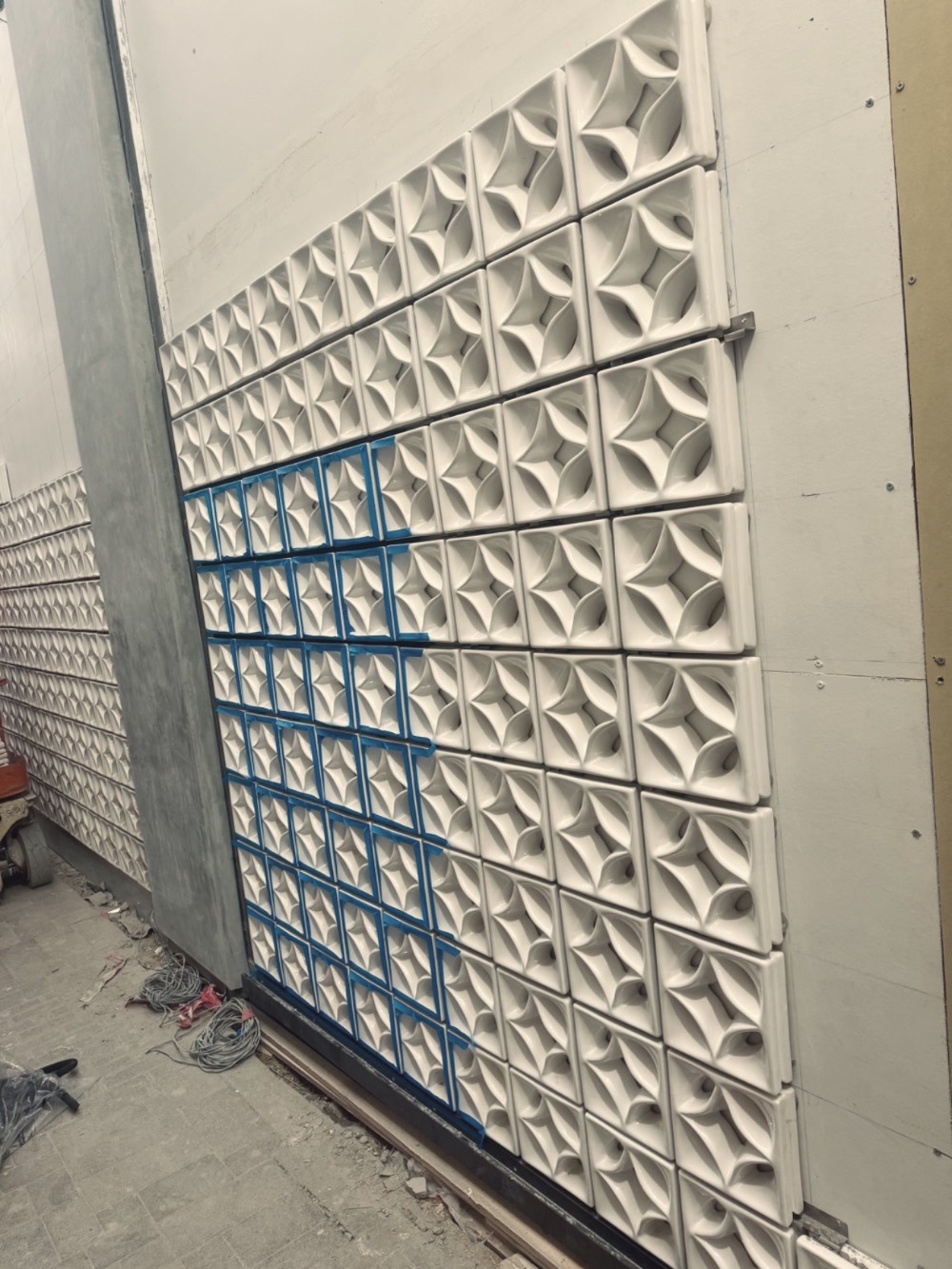 Precision waterproofing service in Irvine, CA with detailed membrane installation around podium deck transitions