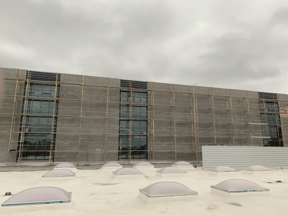 Low-rise commercial building with a rooftop deck